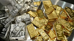 Giá vàng và bạc thế giới giảm nhẹ từ mức cao kỷ lục