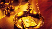 Giá vàng thế giới hôm nay 6/10: Trồi sụt trước sức ép từ USD và lợi suất trái phiếu Mỹ