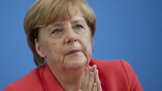 Trái tim của người Đức và sự quyết đoán của bà Merkel