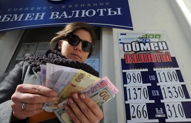 Fitch: Ukraine vỡ nợ một phần do hết khả năng thanh toán