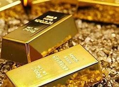 Giá vàng thế giới nggày 14/2 suy yếu gần mức thấp nhất trong hai tháng